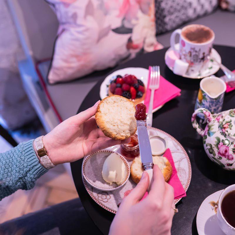 cornish cream tea: jam or cream first on a scone